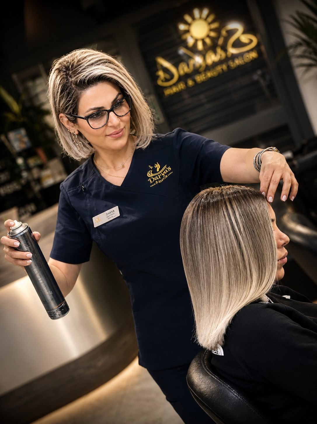 Home 1 Professional hairdresser Darya styling client hair at Darya’s Touch beauty salon in Manchester