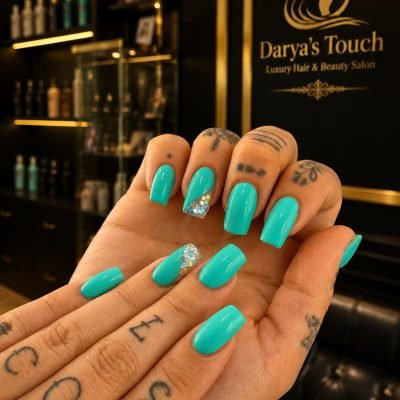 Turquoise nail design at Darya’s Touch beauty salon in Manchester